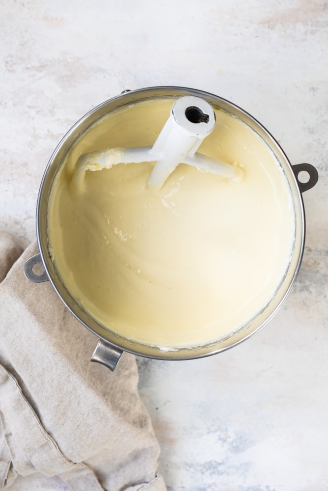 mixing bowl filled with batter for Limoncello Cheesecake Squares