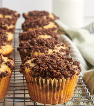 Warm oatmeal chocolate chip muffins cooling on rack