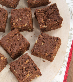 Chewy Graham Brownies on a pale wooden tray