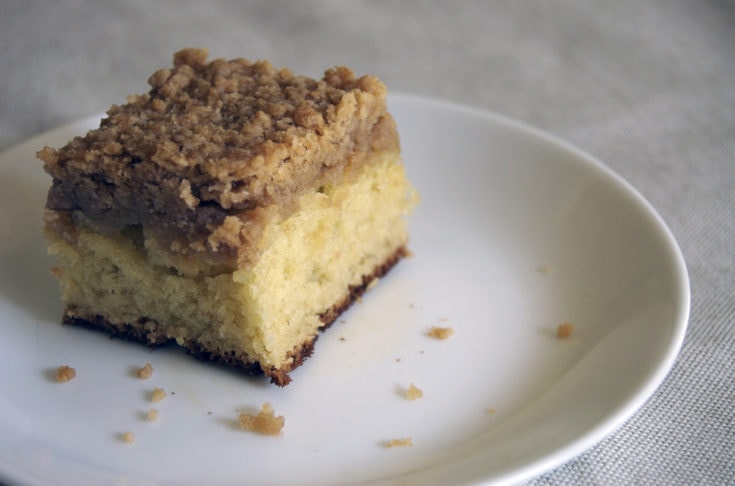 slice of crumb cake on a white plate