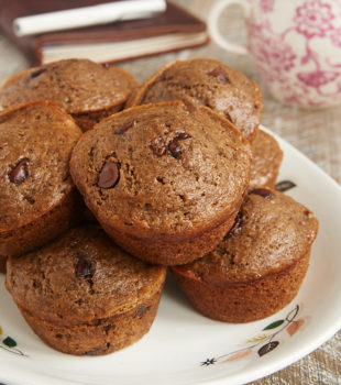 ChocolateChocolate Chocolate Chip Muffins on a white plate