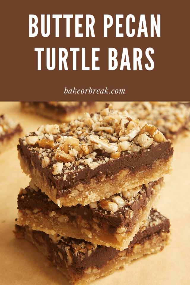 Butter Pecan Turtle Bars stacked on a counter.