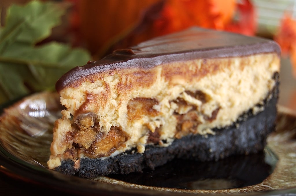 Peanut butter and chocolate fans will enjoy devouring this Peanut Butter Cup Cheesecake. - Bake or Break