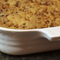 Tuaca adds a hint of citrus and vanilla to this Pecan Crusted Apple-Pear Crisp that features delicious fall fruits topped with a sweet, nutty topping.