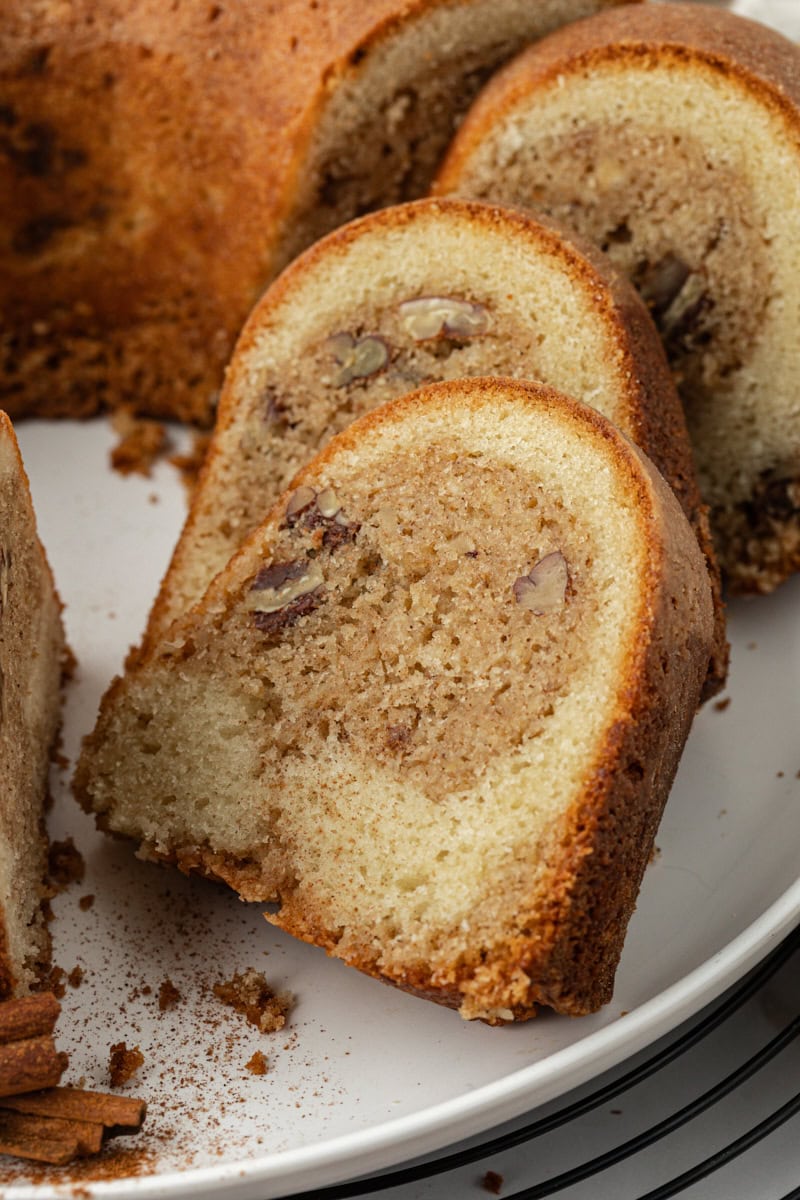 Moist cinnamon crown cake slices on platter