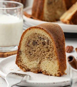 Slice of cinnamon crown cake standing on plate
