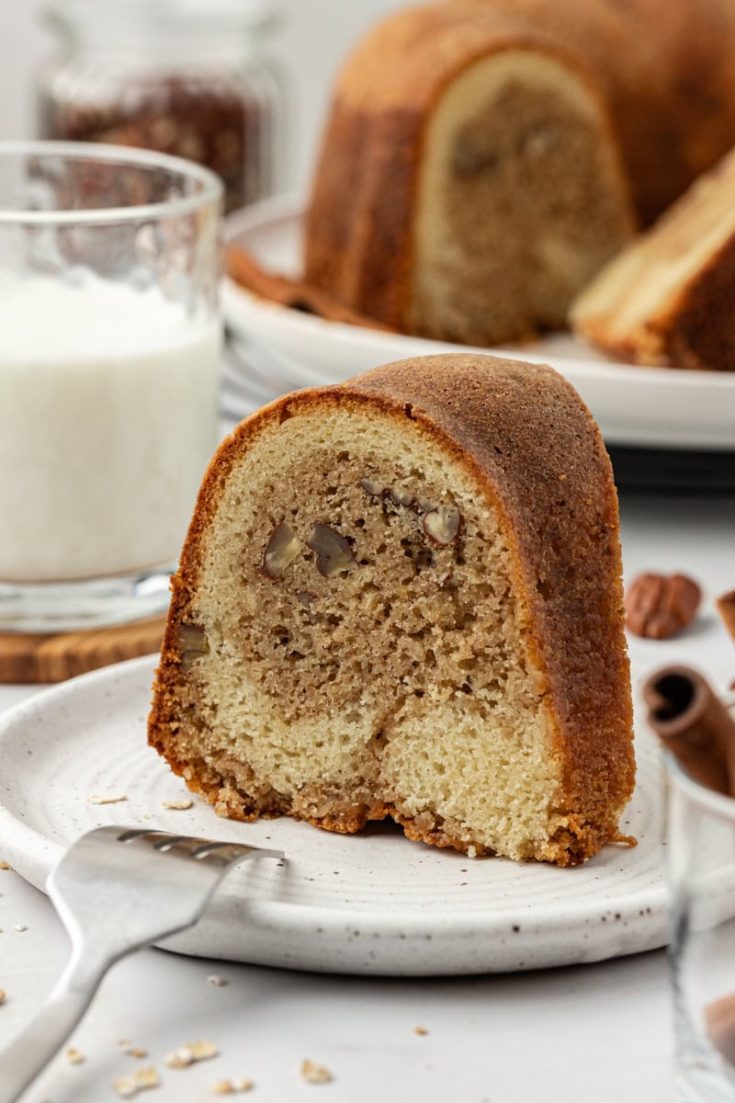 Slice of cinnamon crown cake standing on plate