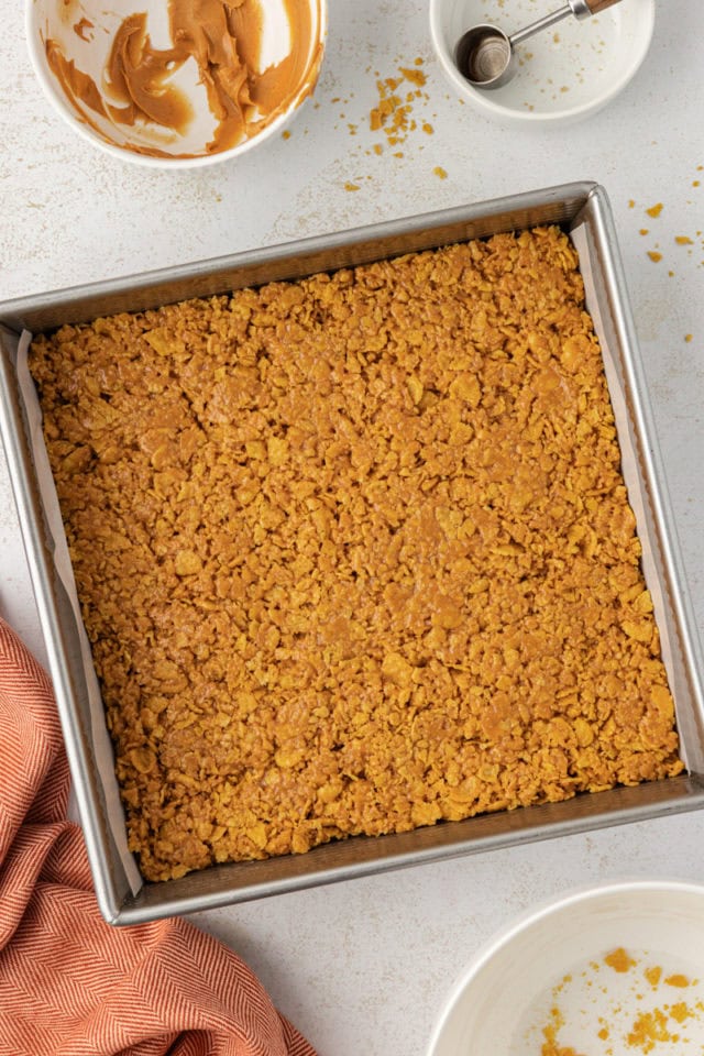 Overhead view of peanut butter cornflake bars in pan