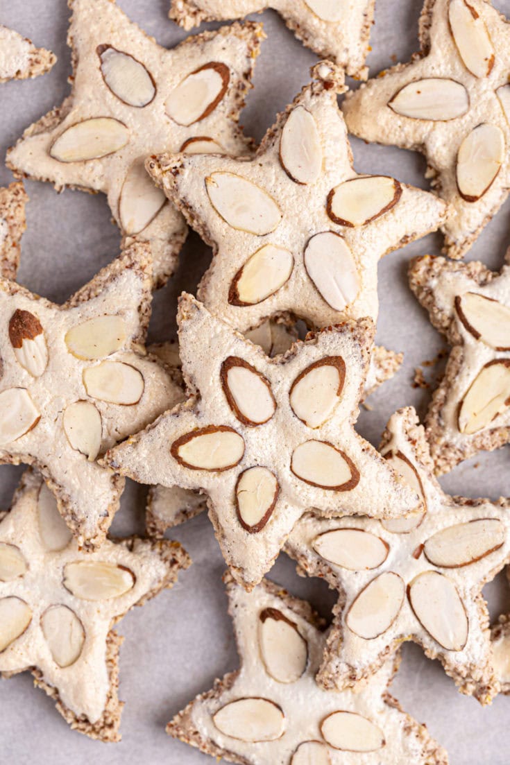 Overhead view of zimtsterne on baking sheet