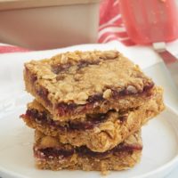 These super simple Oatmeal Raspberry Bars are always such a hit. I love that I always have everything in my kitchen to make these! - Bake or Break