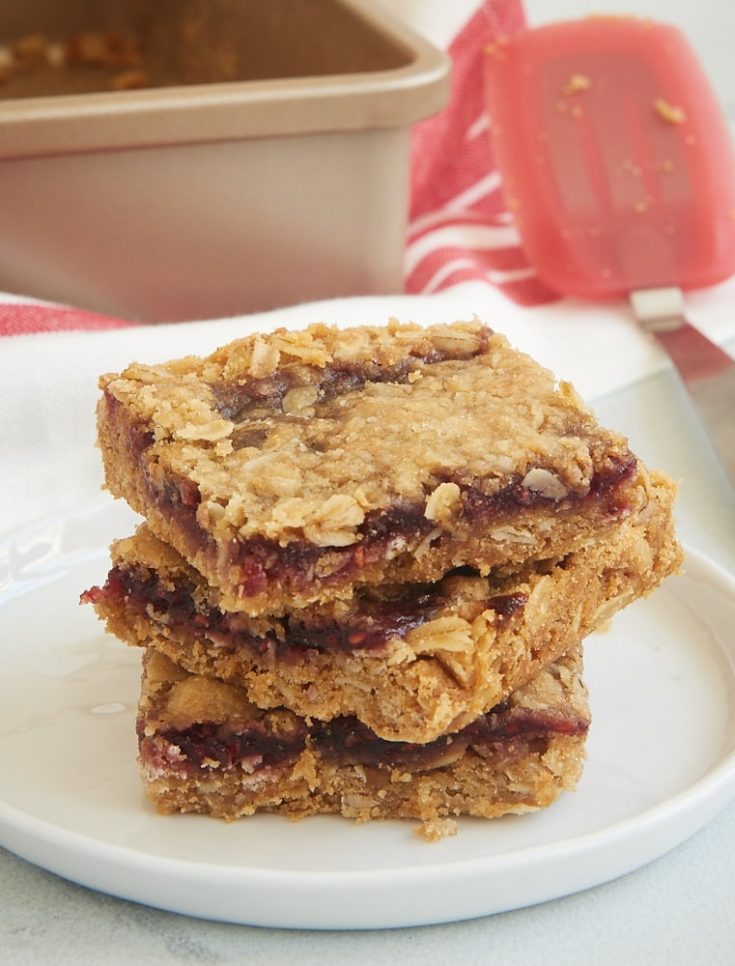 These super simple Oatmeal Raspberry Bars are always such a hit. I love that I always have everything in my kitchen to make these! - Bake or Break