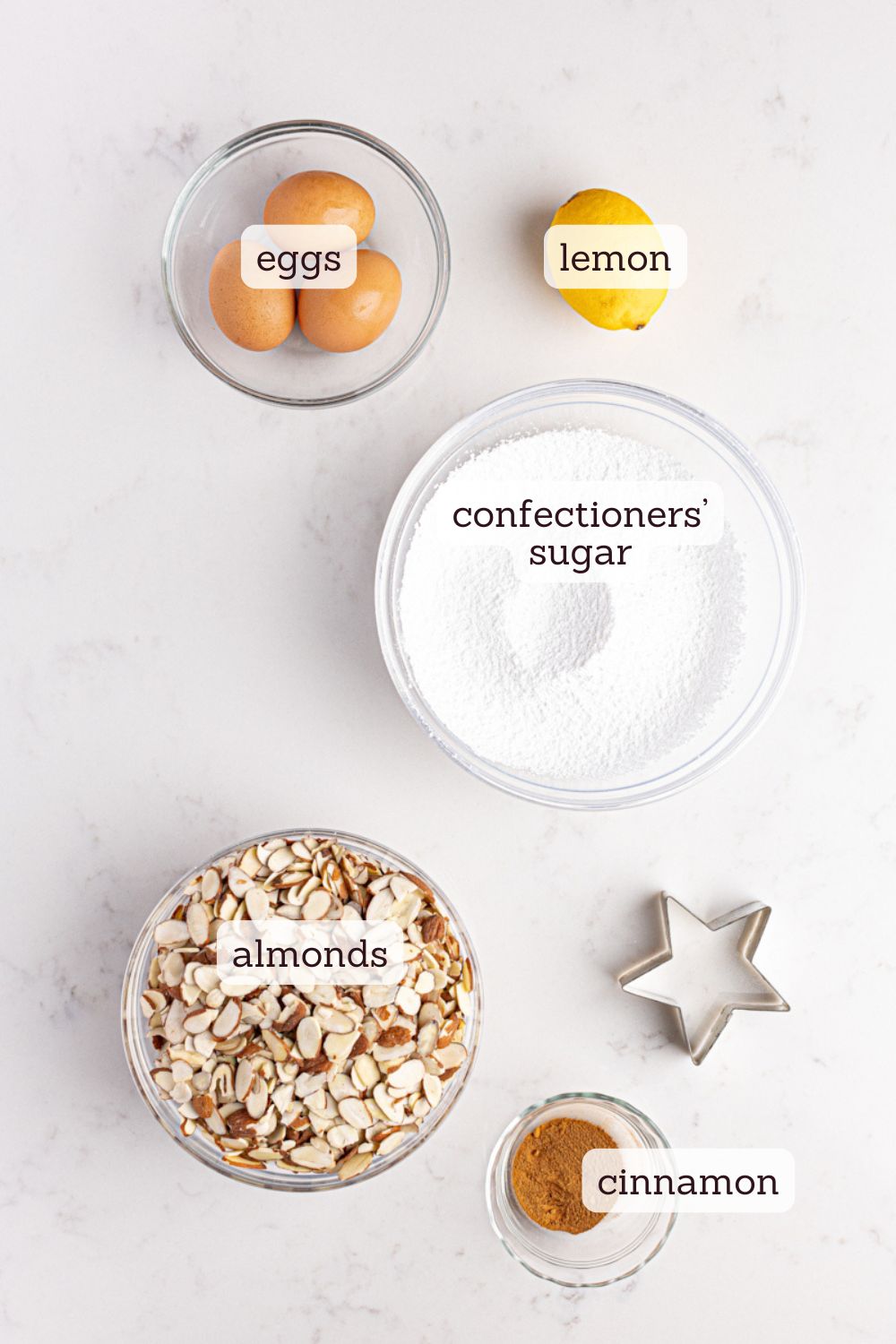 Overhead view of ingredients for zimtsterne cinnamon stars