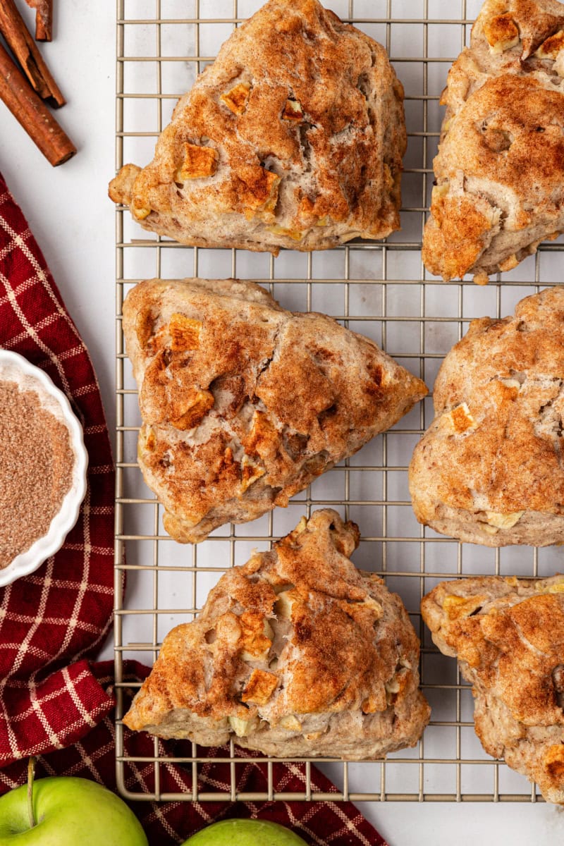 Overhead view of apple cinnamon scones on wire rack