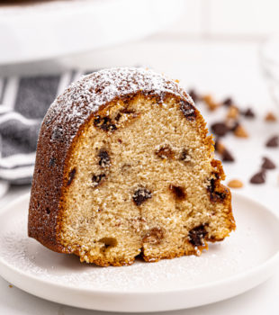 Slice of peanut butter pound cake standing upright on plate