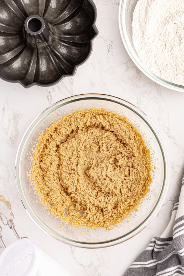 Overhead view of creamed butter, sugars, and peanut butter