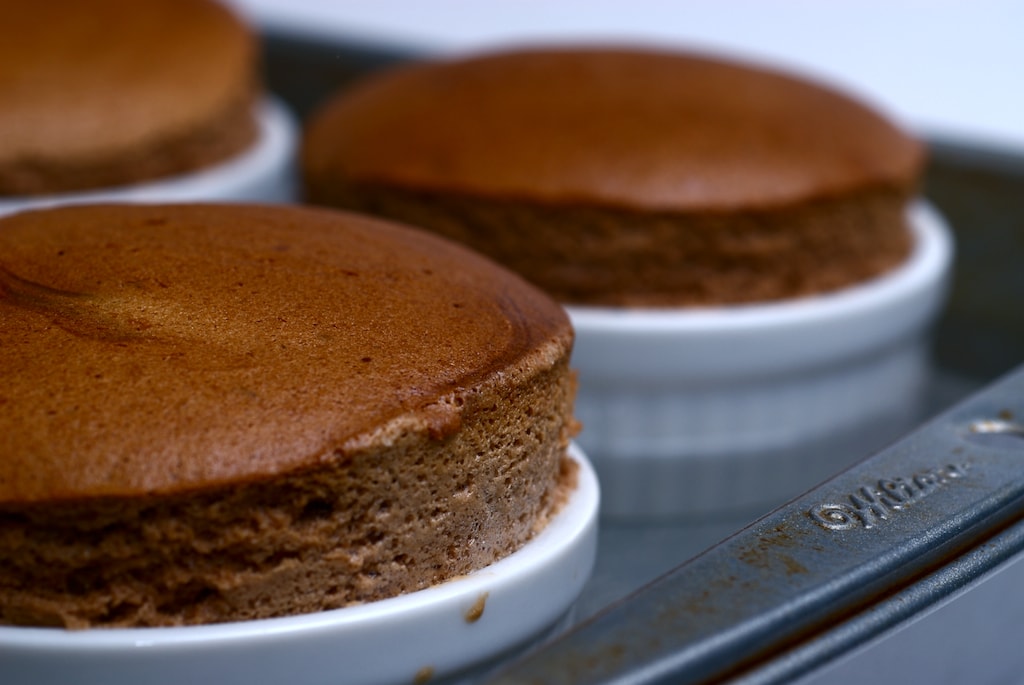 There's a chocolate-hazelnut surprise inside these Giandua Souffles. - Bake or Break
