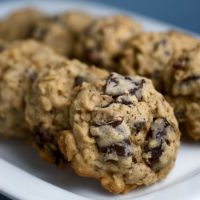 Dark Chocolate Chunk and Dried Cherry Oatmeal Cookies on a white plate