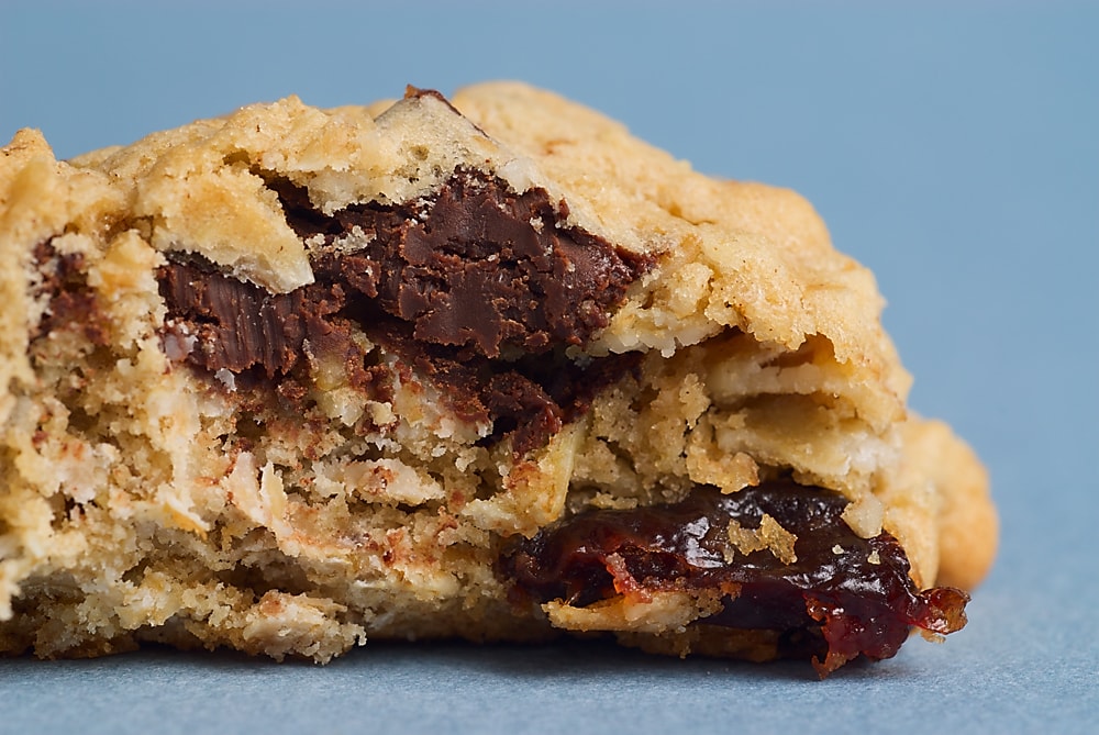 half of a Dark Chocolate Chunk and Dried Cherry Oatmeal Cookie