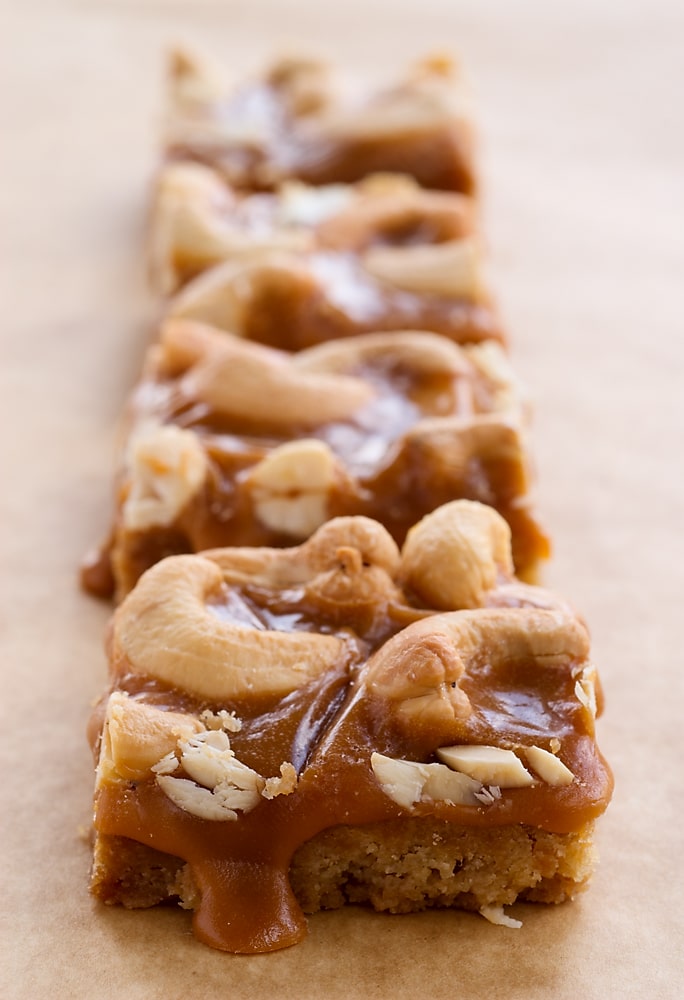 Butterscotch Cashew Bars on parchment paper