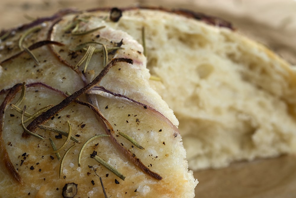 Focaccia with Onion and Rosemary is the perfect companion to a hearty meal. Topped with onion, rosemary, salt, and pepper, it's so full of amazing flavor! - Bake or Break