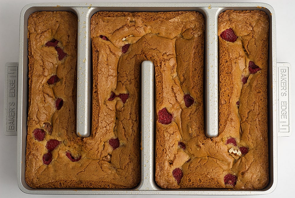 Raspberry Pecan Blondies offer a fresh fruit twist on traditional blondies. Fresh raspberries and pecans make for a deliciously sweet treat! - Bake or Break