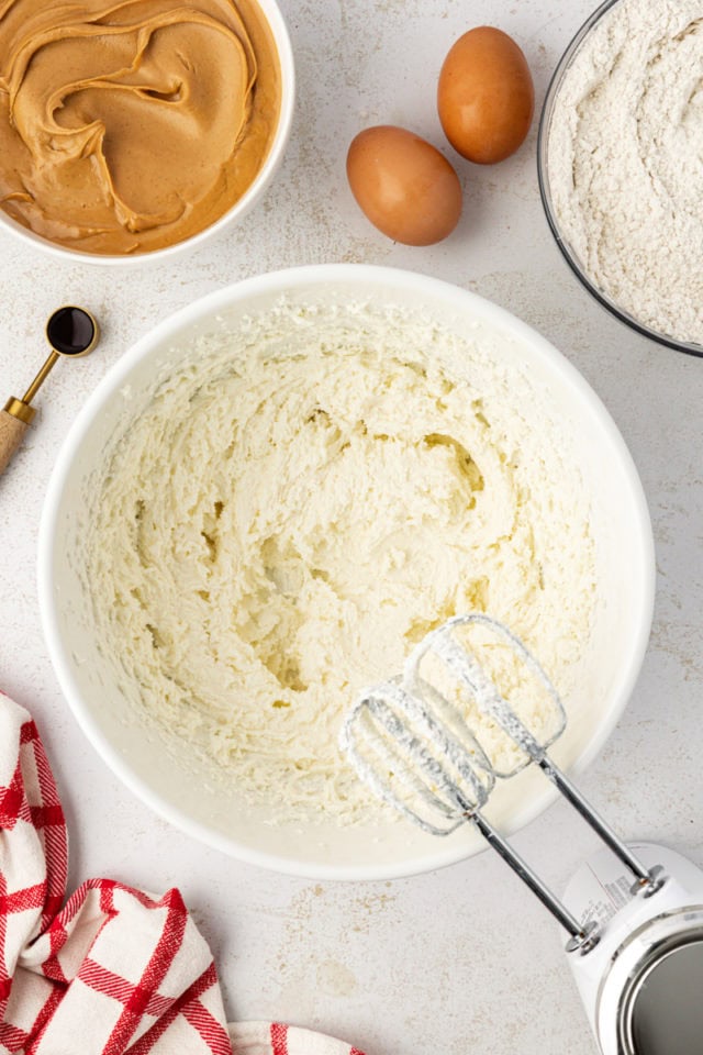 Overhead view of whipped butter and sugar in mixing bowl