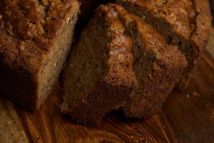 sliced Pear Bread on a wooden cutting board