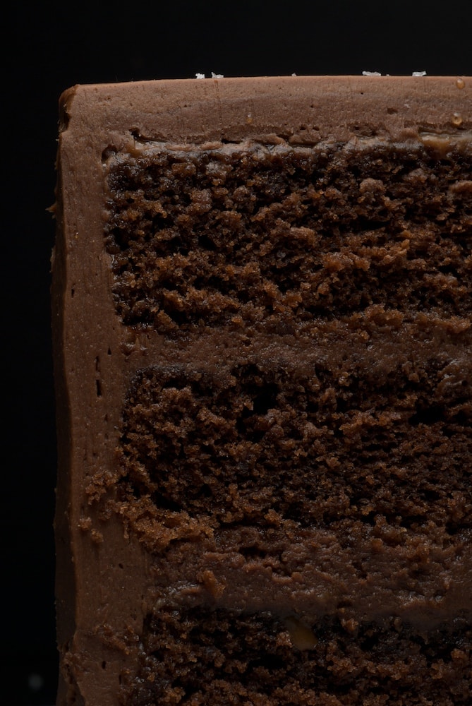 Slice of Sweet and Salty Cake with chocolate-caramel frosting.