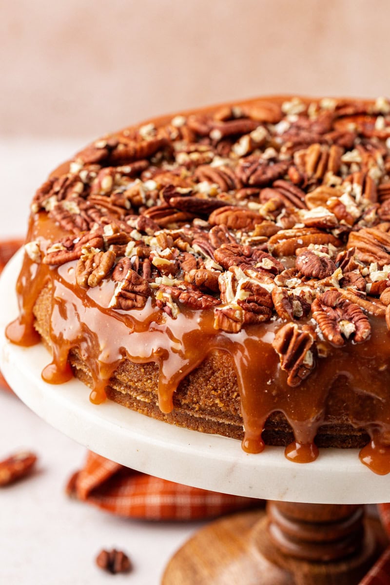 Whole salted caramel cheesecake on cake stand