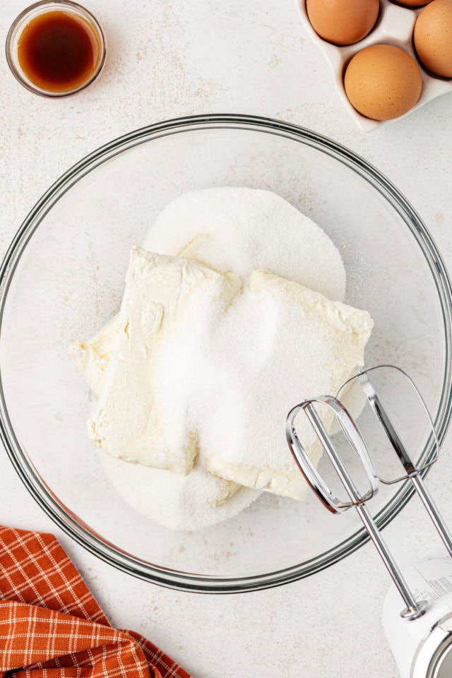 Overhead view of sugar and cream cheese in bowl