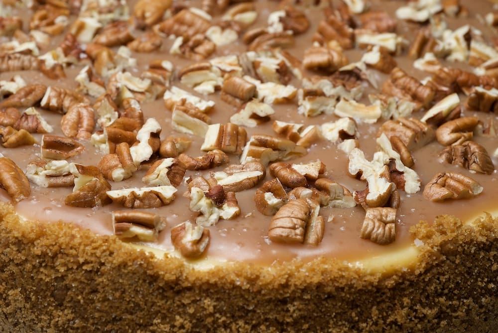 Pecan and Salted Caramel Cheesecake takes traditional cheesecake and ups the ante with rich caramel, toasty pecans, and a sprinkling of salt. - Bake or Break