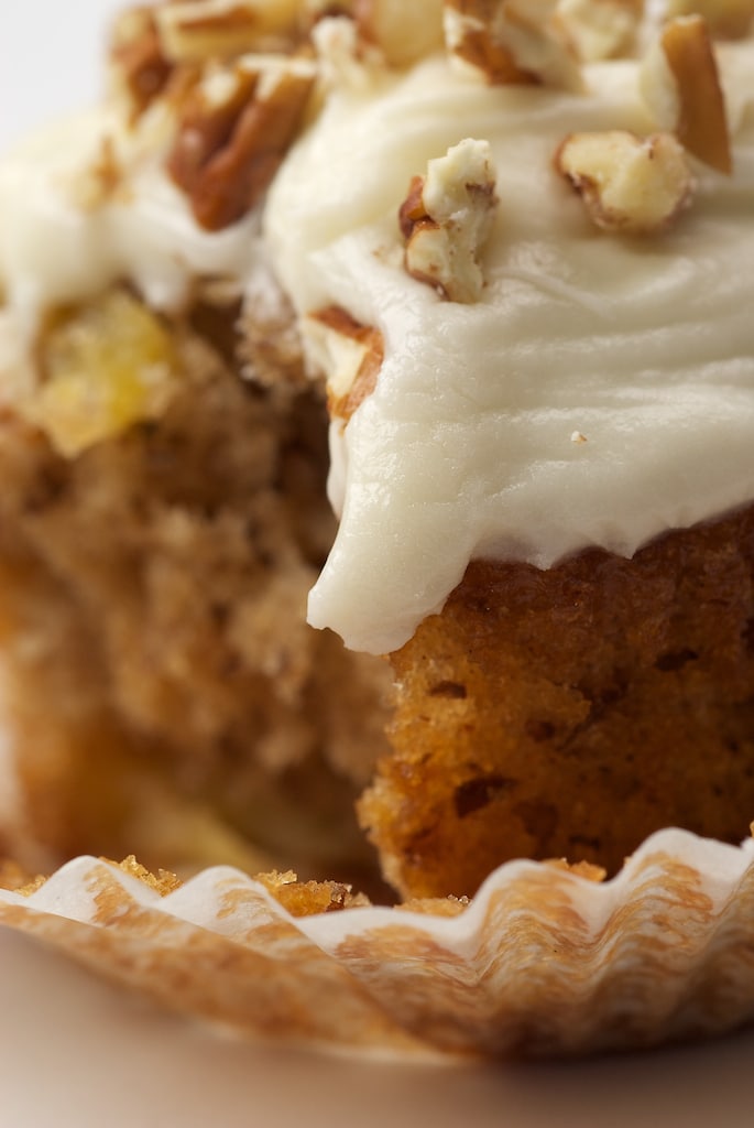 close up of a Hummingbird Cupcake with a bite missing