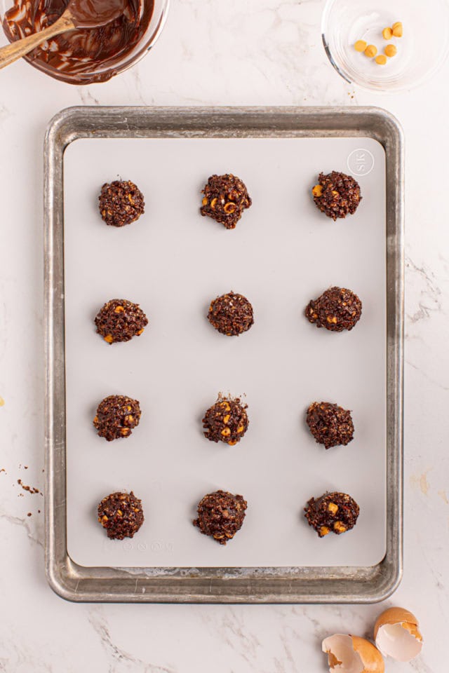 Overhead view of dough for chocolate butterscotch cookies on baking sheet