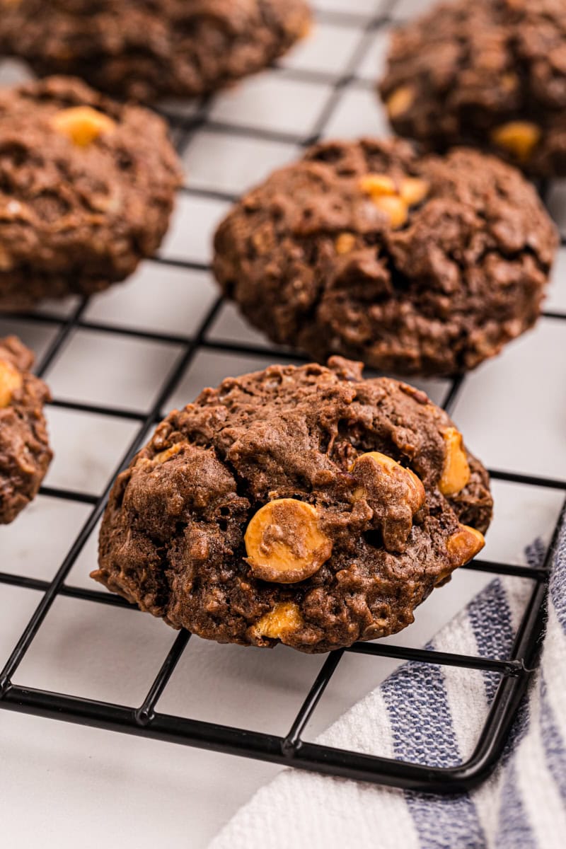 Closeup of chocolate butterscotch cookies on wire rack