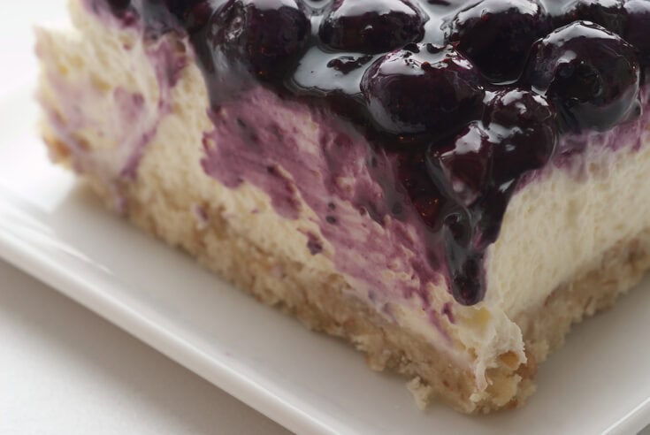 slice of Blueberry Jamboree on a square white plate