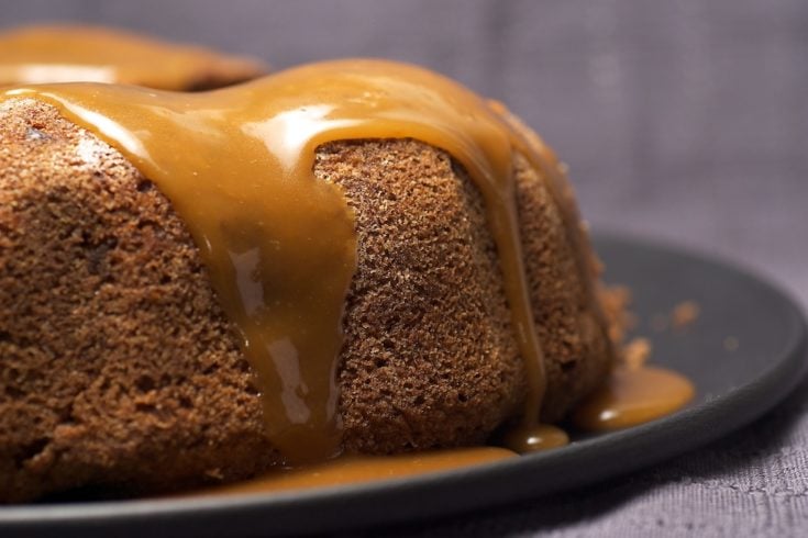 Apple Spice Cake topped with a caramel glaze