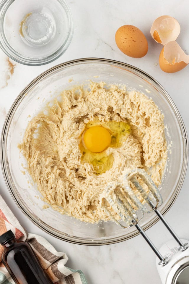 Overhead view of egg added to blondie batter