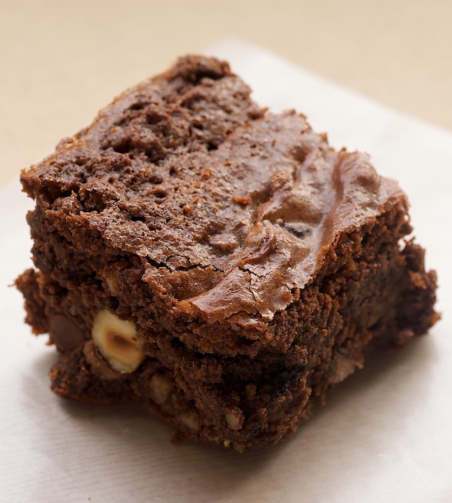 Kitchen sink brownie on parchment paper.