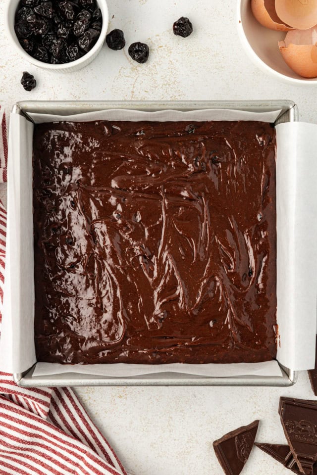 Dark chocolate sour cherry brownies in pan before baking