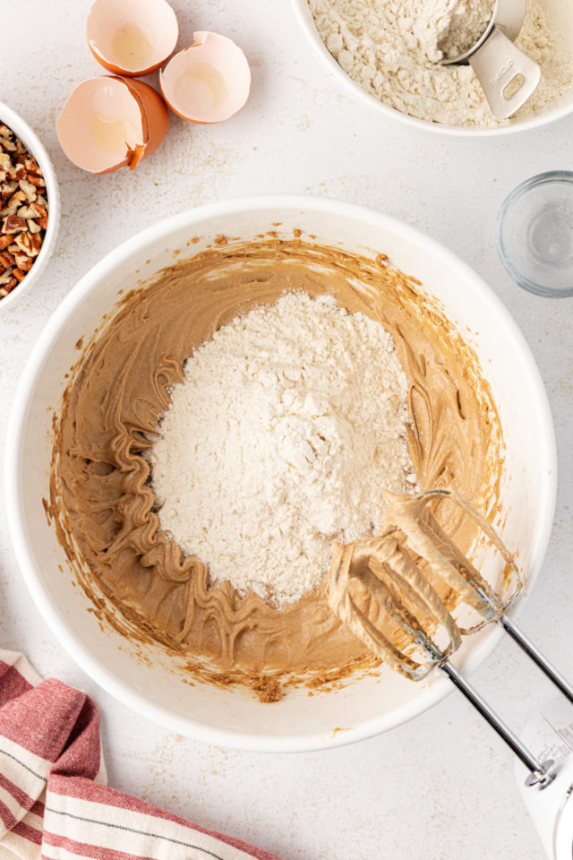 Dry ingredients added to wet ingredients for brown sugar crinkle cookies