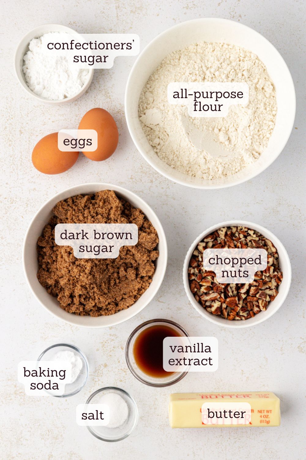 Overhead view of ingredients for brown sugar crinkle cookies with labels