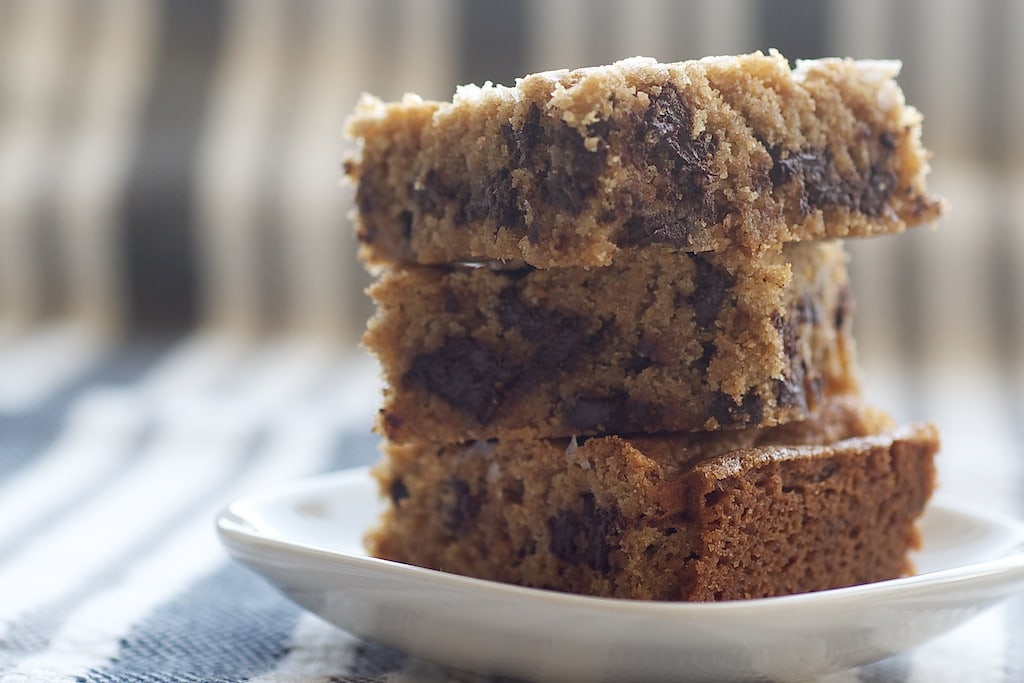 Salty Chocolate Chunk Blondies are filled with dark chocolate chunks and topped with a sprinkling of coarse salt. A great sweet and salty treat!