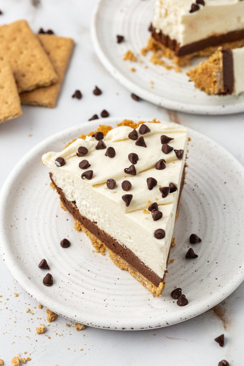 Top-down view of chocolate cookie dough cheesecake slice on plate