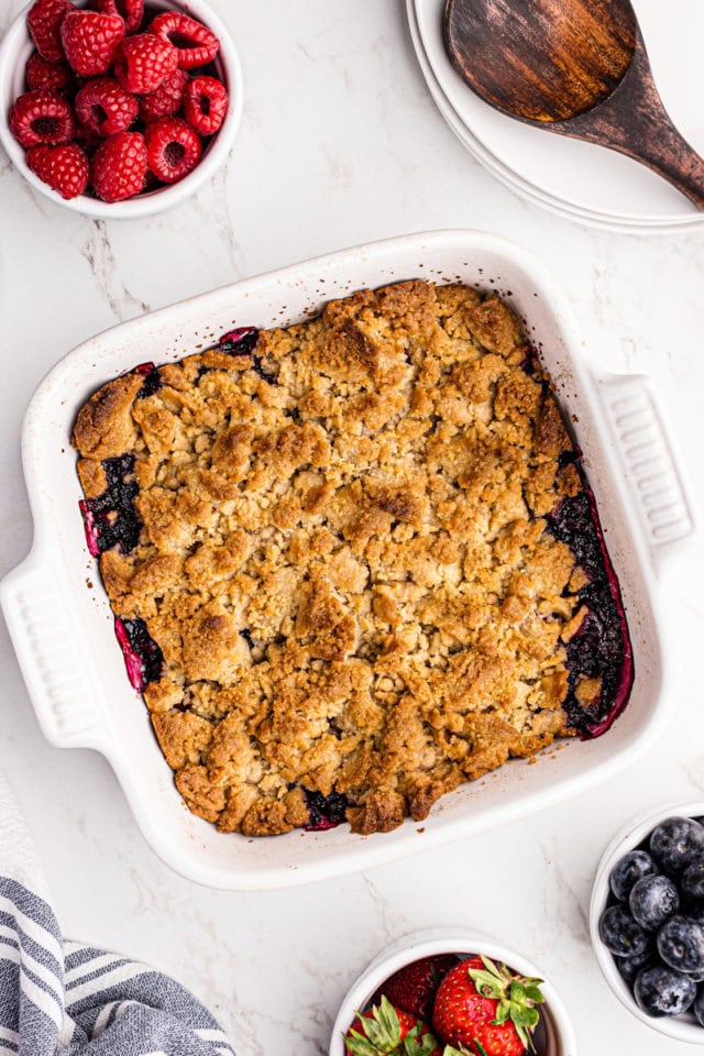 Overhead view of mixed berry cobbler in baking dish