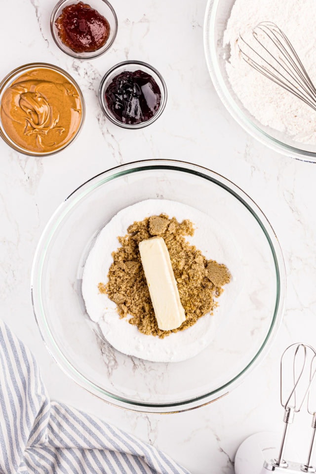 Butter and sugars in mixing bowl