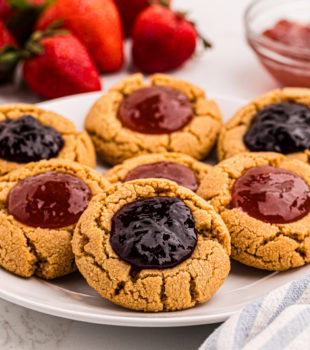 Plate of peanut butter and jelly thumbprint cookies