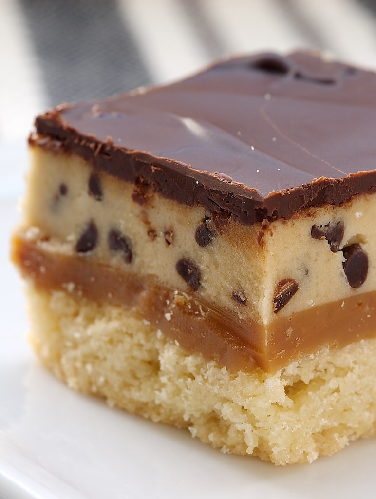 Close-up view of a cookie dough billionaire bar.