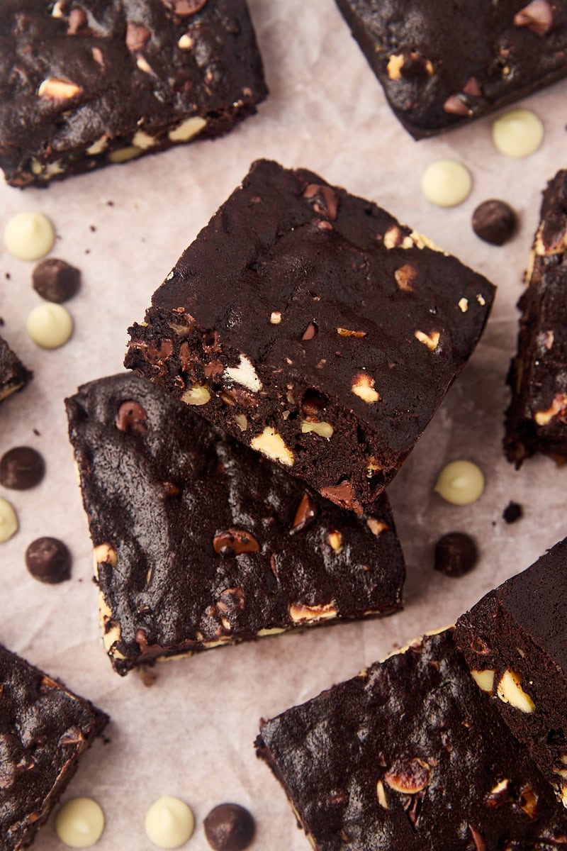 Triple chocolate brownies on parchment paper