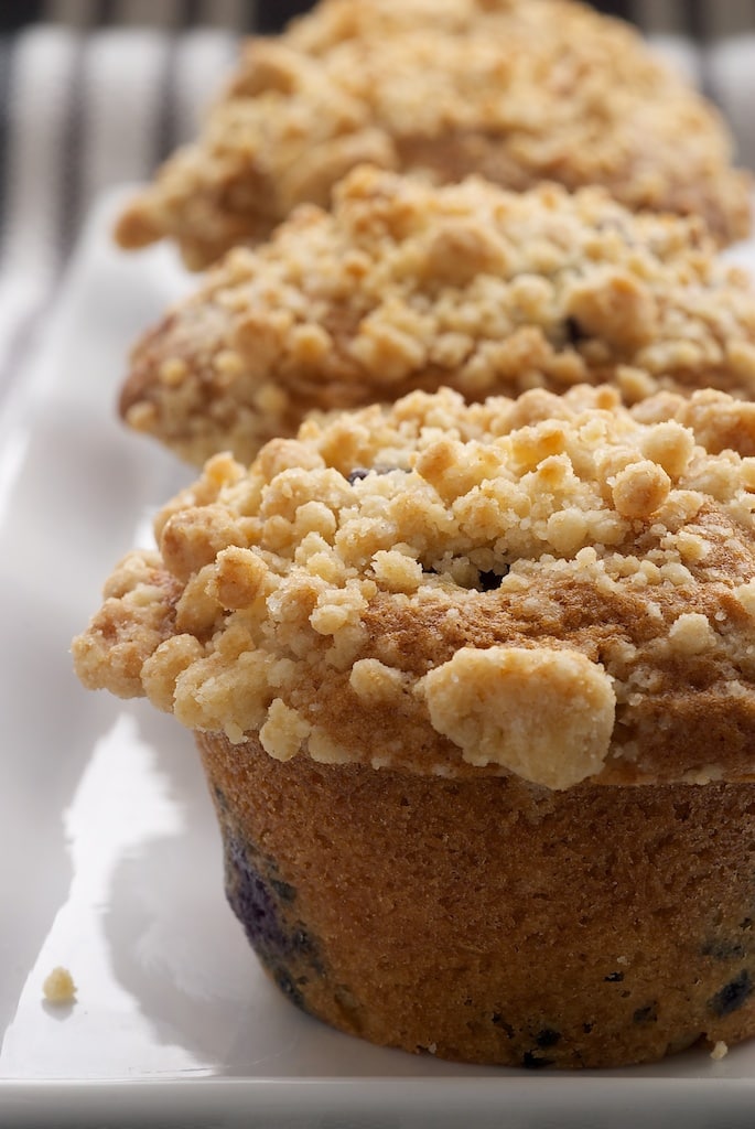 Blueberry Crumb Muffins are a classic breakfast treat. These traditional muffins get a little extra flavor from a sweet crumb topping. - Bake or Break