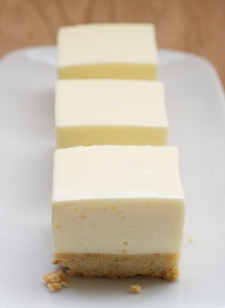 Lemon Icebox Bars are deliciously cool and refreshing. The hint ginger and hazelnuts in the crust really make them extra tasty! - Bake or Break